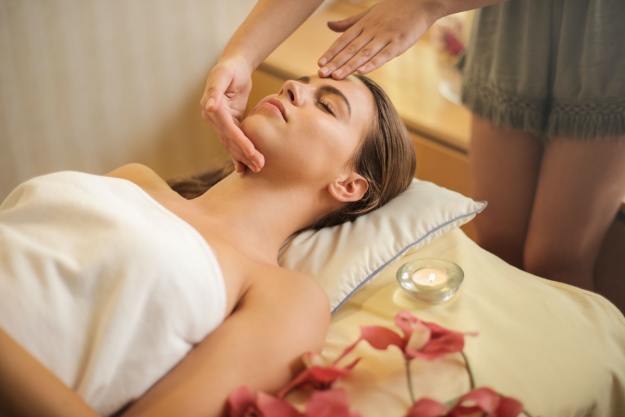 A woman relaxing at a spa.