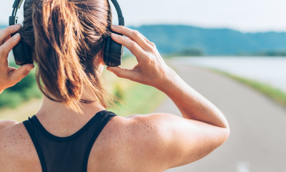 best workout podcasts running woman headphones runner