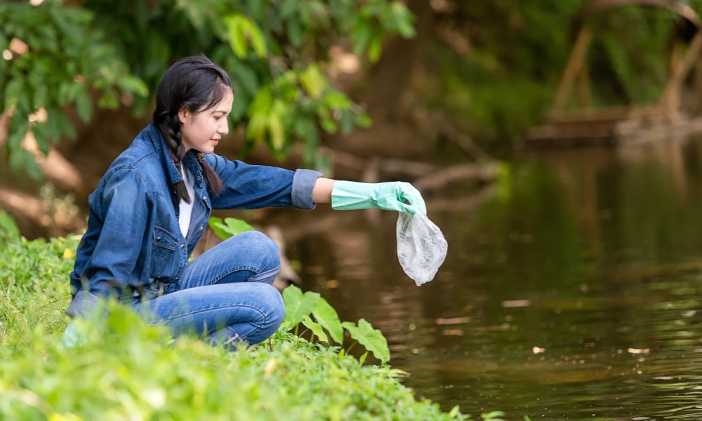 outdoor dates woman river cleanup