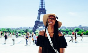 a happy woman in paris