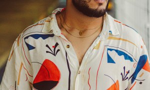 Man wearing patterned button-up shirt